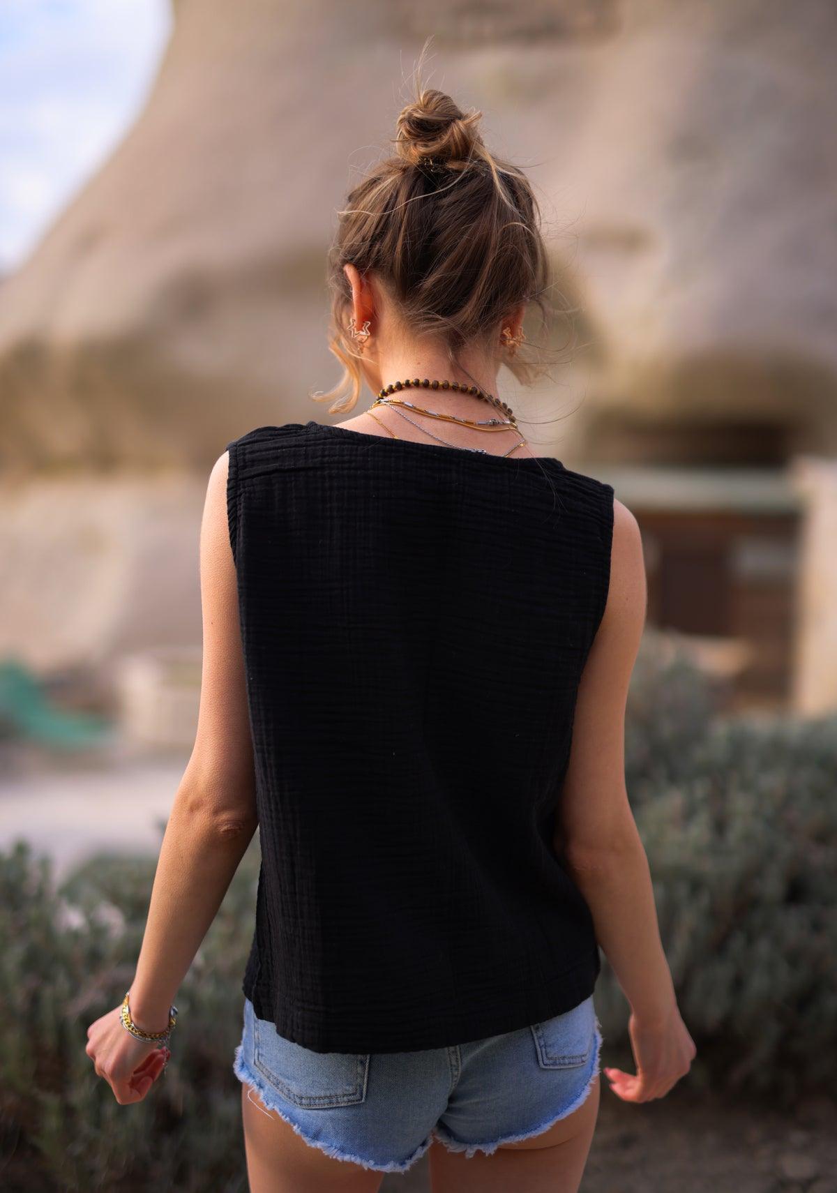 black sleeveless top