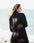 Woman in a black evil eye cover up by the water #Color_Black_Evil_Eye