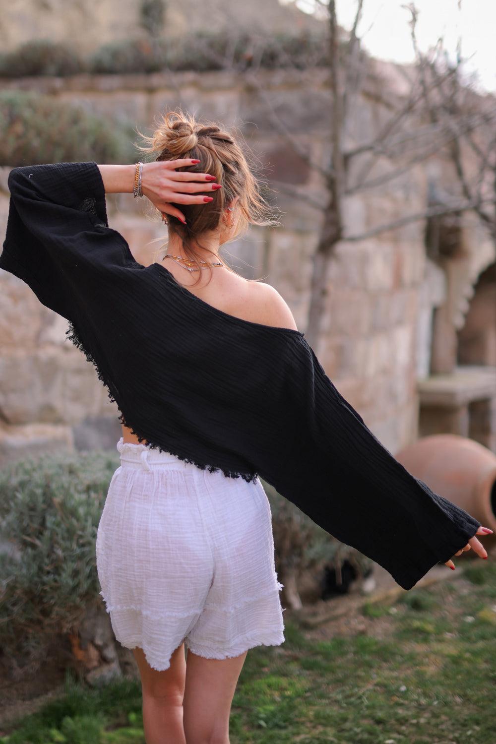 black long sleeve off the shoulder top