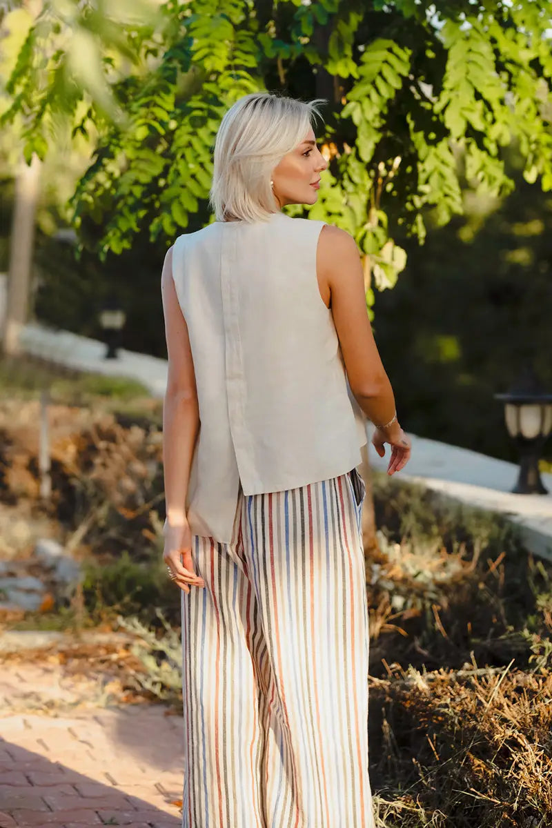 Close up of linen multi stripe wide leg palazzo pants fabric and stripe pattern