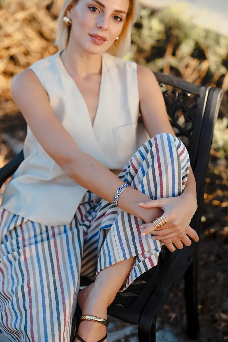 Front view of linen multi stripe wide leg palazzo pants with pull on elastic waist