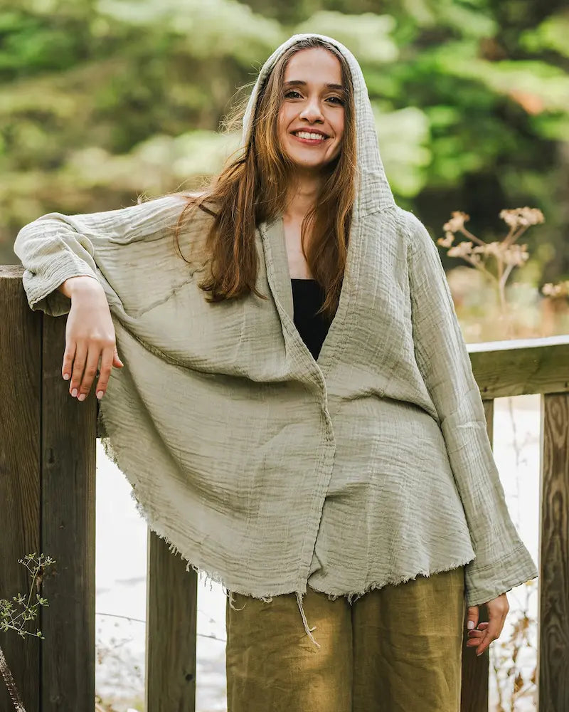 female wearing green kimono hoodie