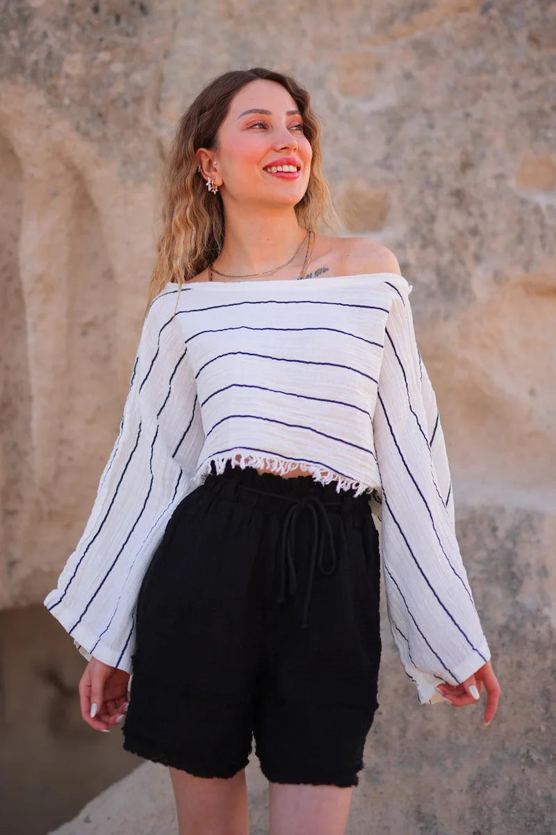 woman wearing double gauze cotton striped off the shoulder top with black cotton short